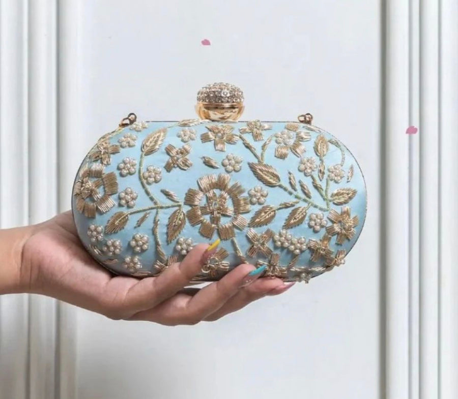 Embroidered clutches --