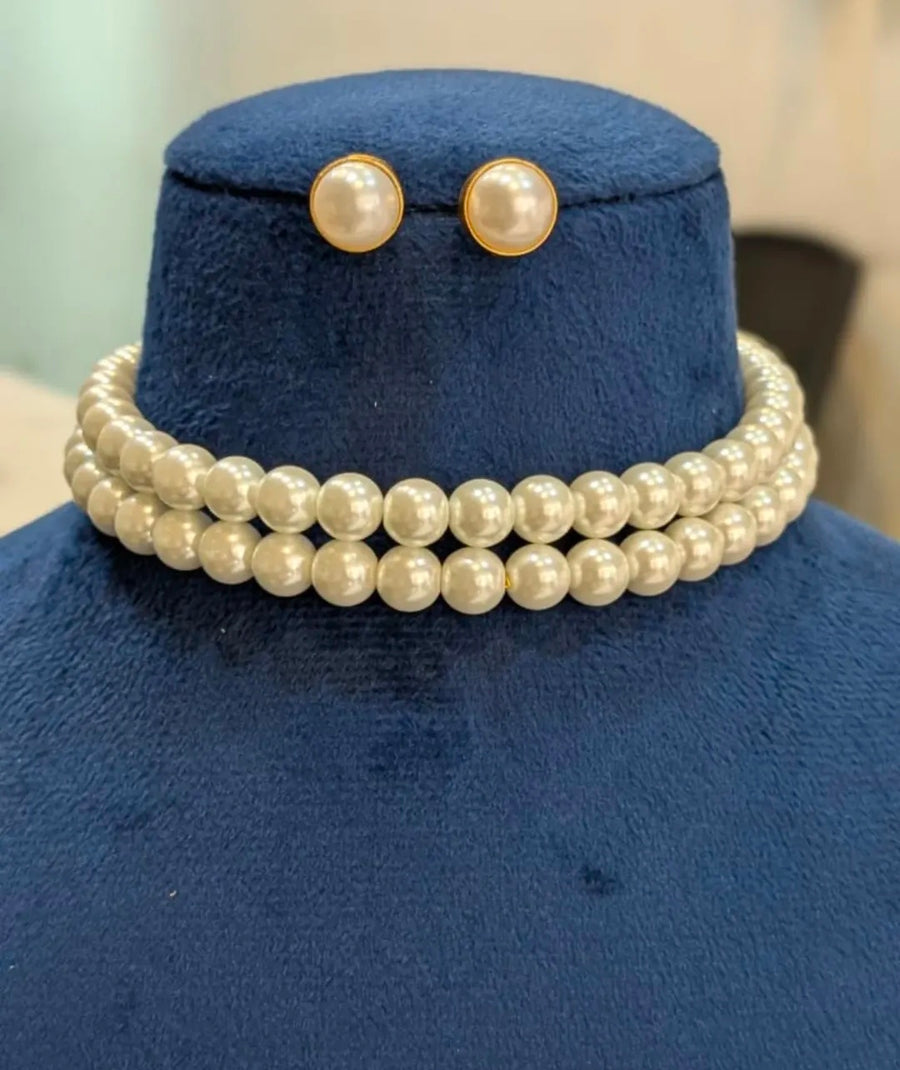 Elegant pearl choker with studs
